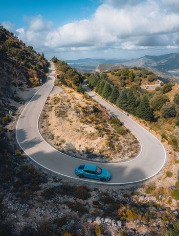 taycan on long road